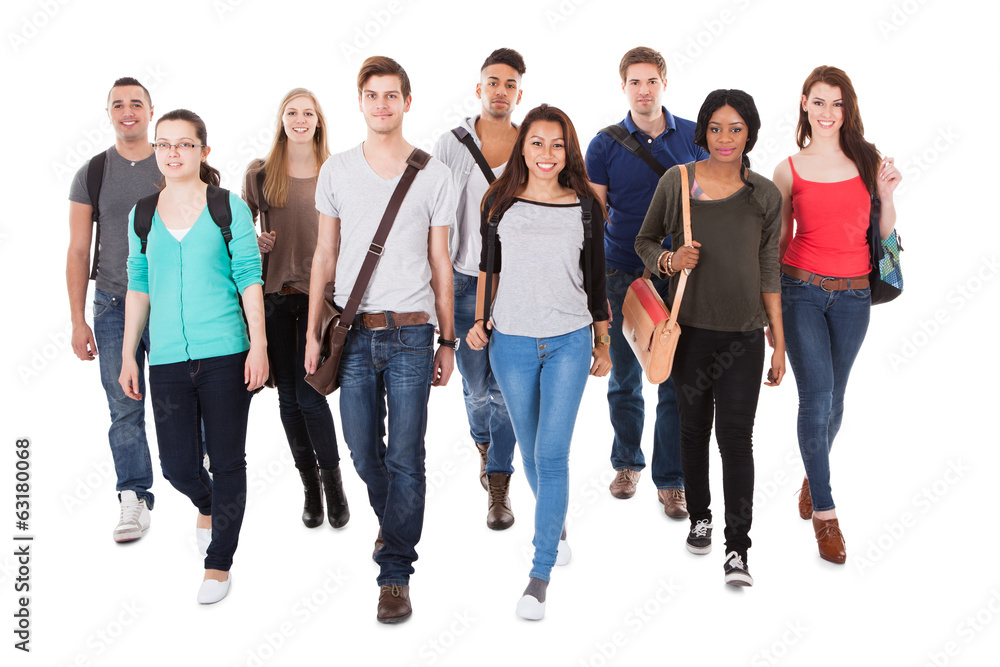 Confident University Students Walking Over White Background Confident University Students Walking Over White Background
