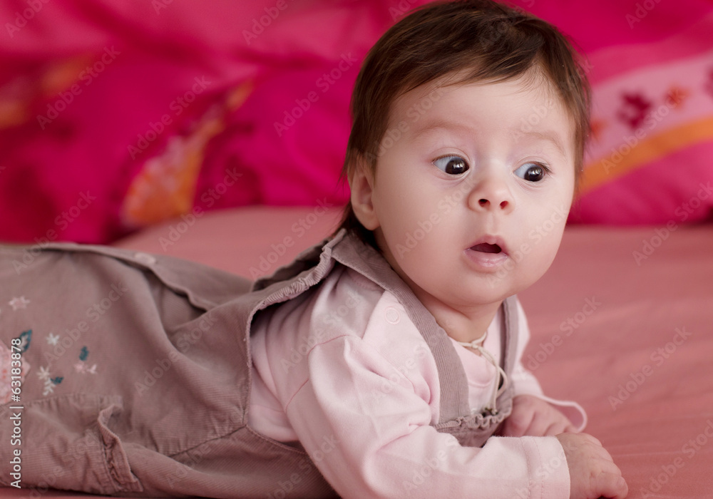 Beautiful baby girl on pink background Beautiful baby girl on pink background