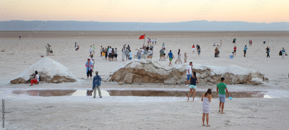 Tourists at salt lake Chott El Jerid