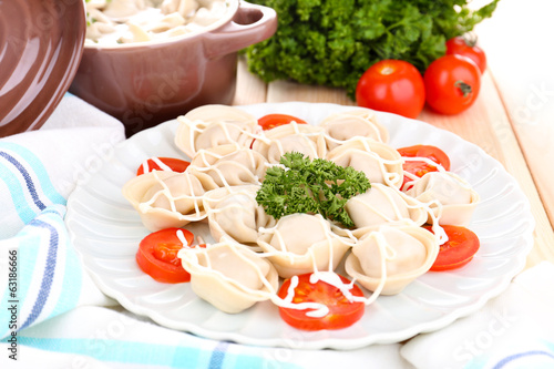 Meat dumplings - russian boiled pelmeni close up