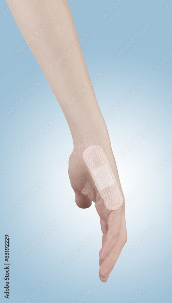 Adhesive Healing plaster on finger. Adhesive Healing plaster on finger.