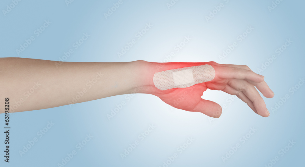 Adhesive Healing plaster on finger.