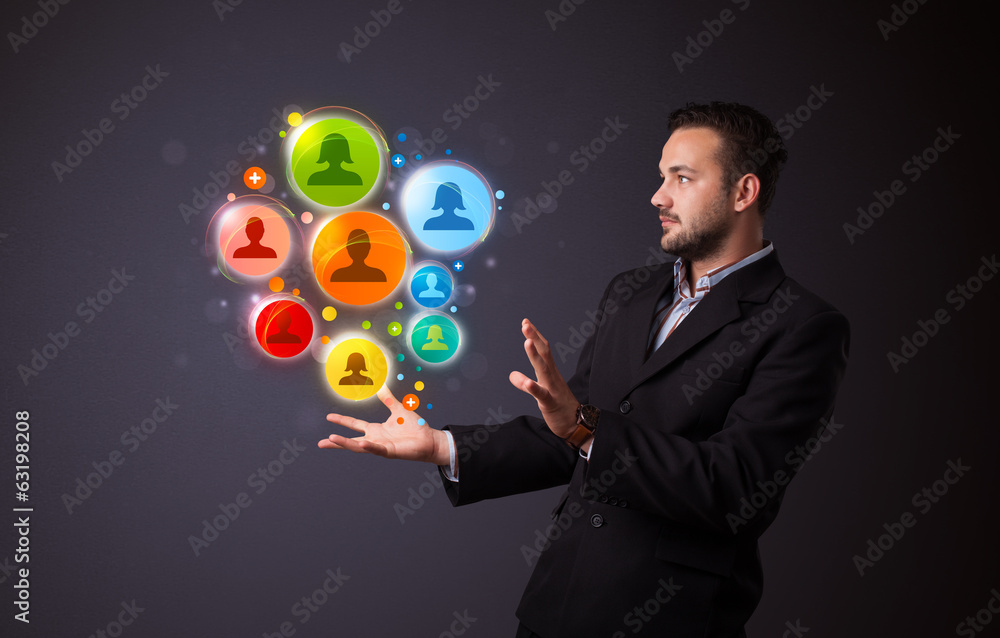Social network icons in the hand of a businessman Social network icons in the hand of a businessman