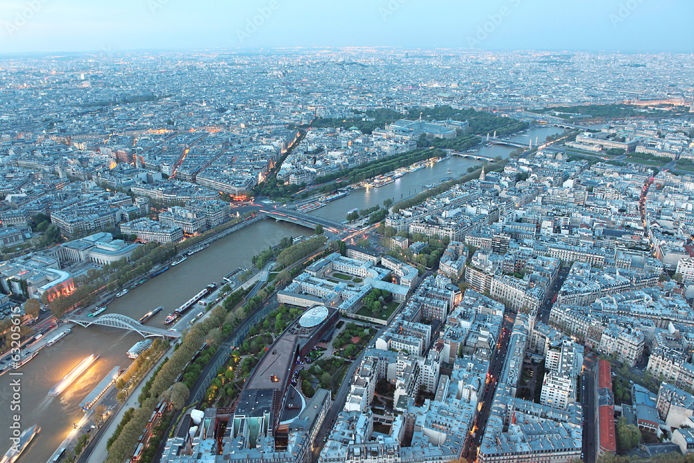 Famous evening view of Paris with the Seine river from the Eiffe