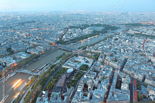 Famous evening view of Paris with the Seine river from the Eiffe