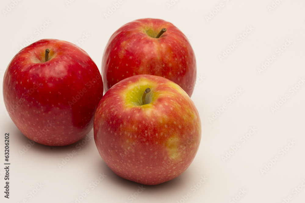 Apples 'Pink Lady' isolated on white background Apples 'Pink Lady' isolated on white background
