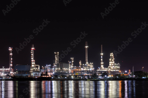 Oil refinery at night with reflection © wirojsid