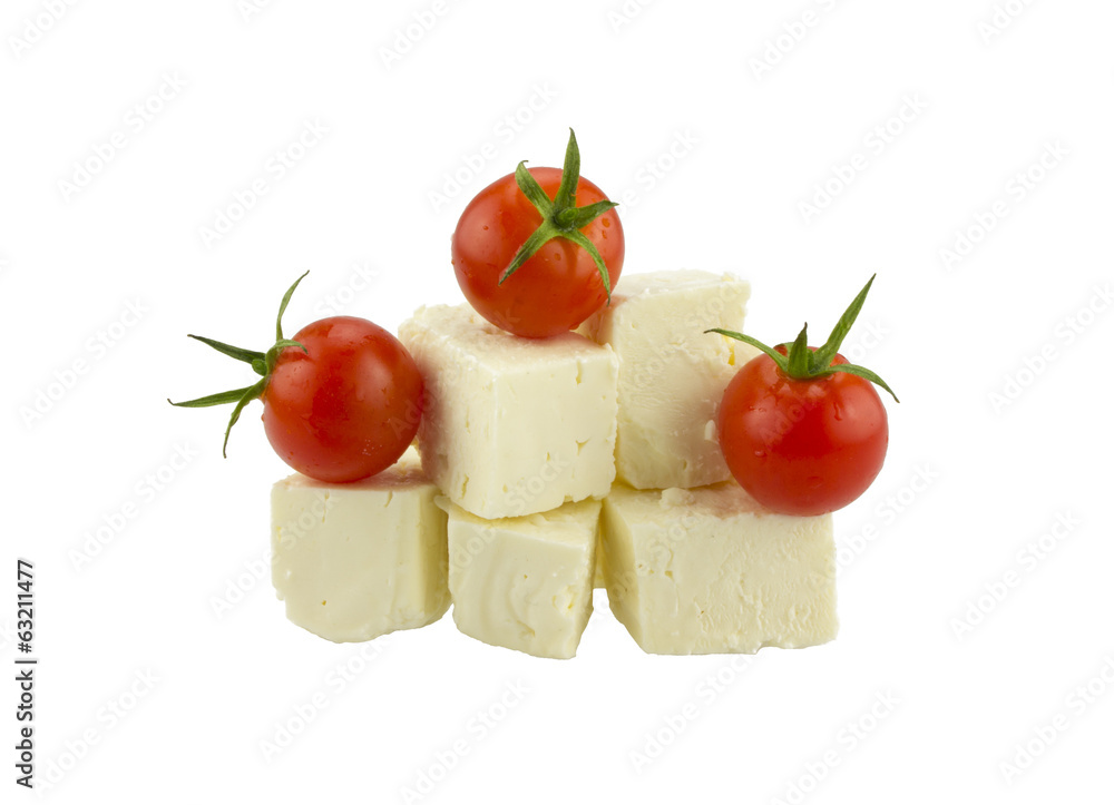 Cherry tomatoes and Greek cheese. Isolated on white Cherry tomatoes and Greek cheese. Isolated on white