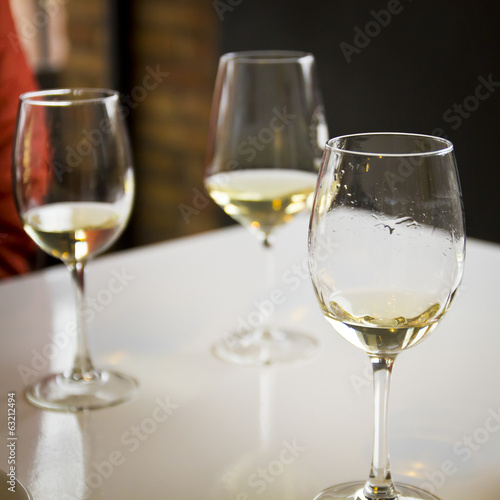 Three glasses of white wine