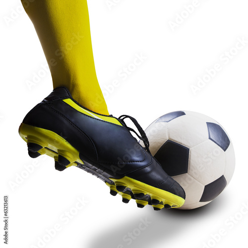 Foot kicking soccer ball isolated
