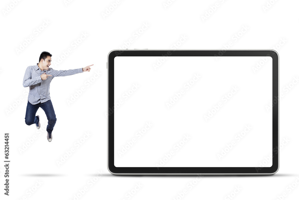 Happy man pointing at empty board