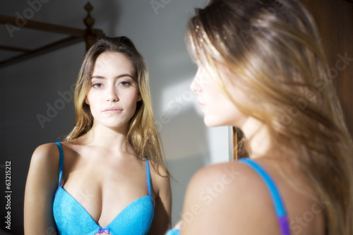 beautiful sexy woman in mirror