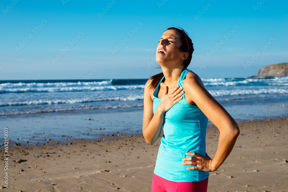 Exhausted female runner suffering angina pectoris Exhausted female runner suffering angina pectoris