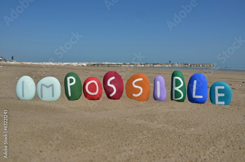 impossible is possible concept on stones