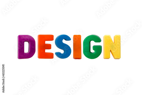 The word design in multicolored plastic letters isolated on white background.