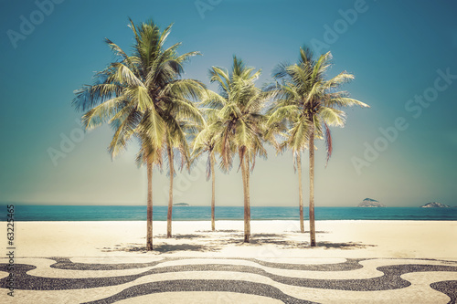 Fototapeta Naklejka Na Ścianę i Meble -  Palms on Copacabana Beach in Rio de Janeiro