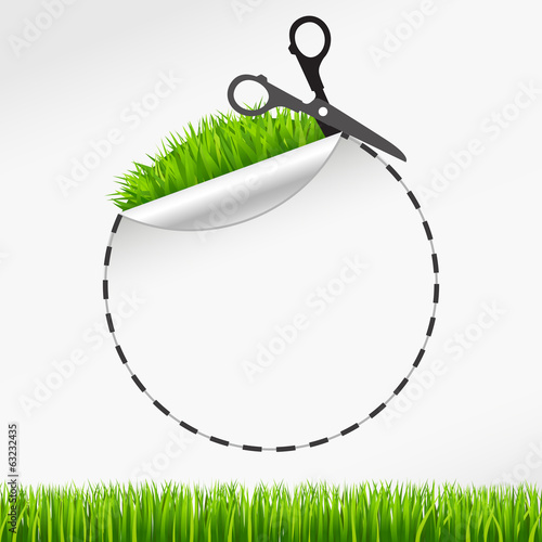 scissors cut round sticker. Green grass
