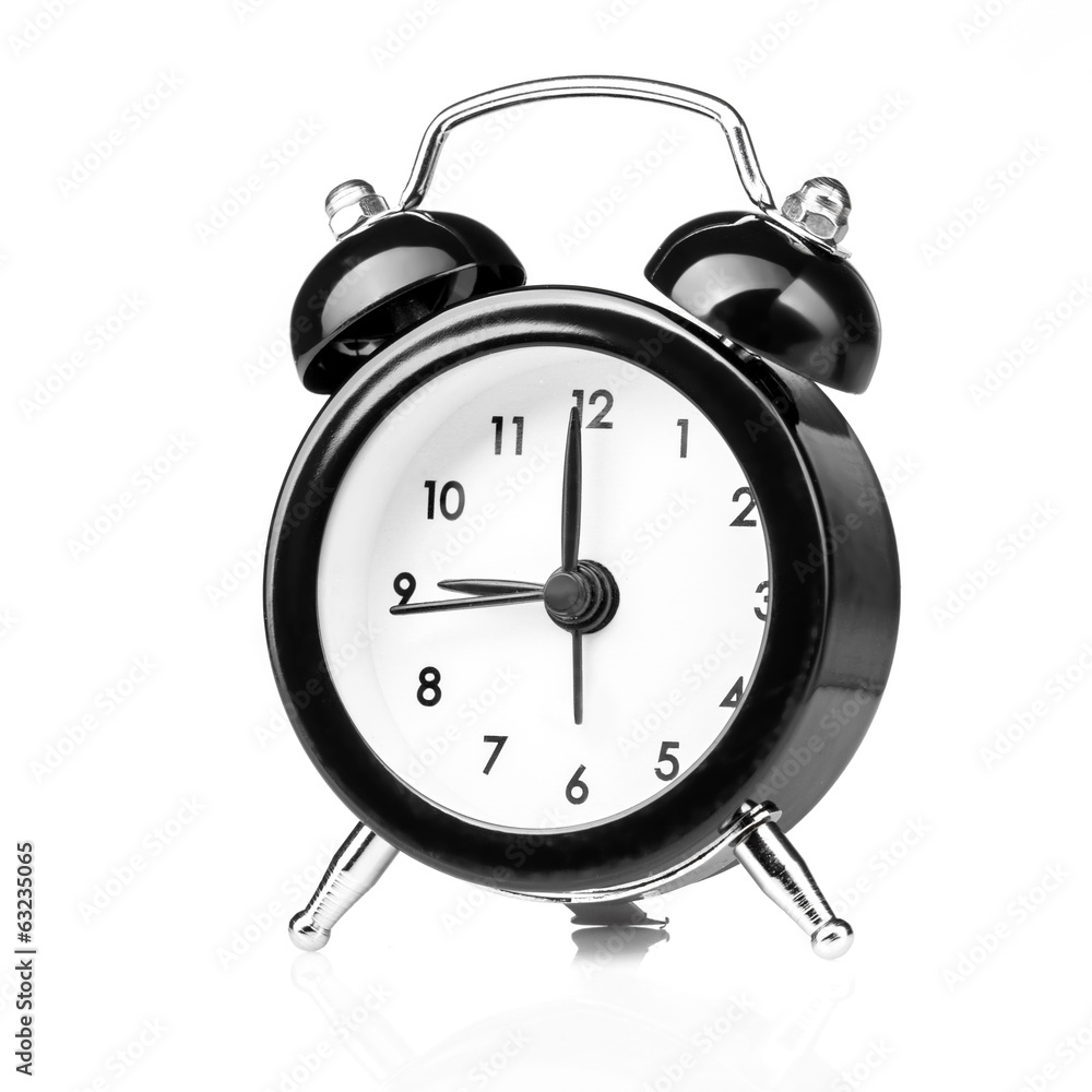 Black old style alarm clock isolated on white Black old style alarm clock isolated on white