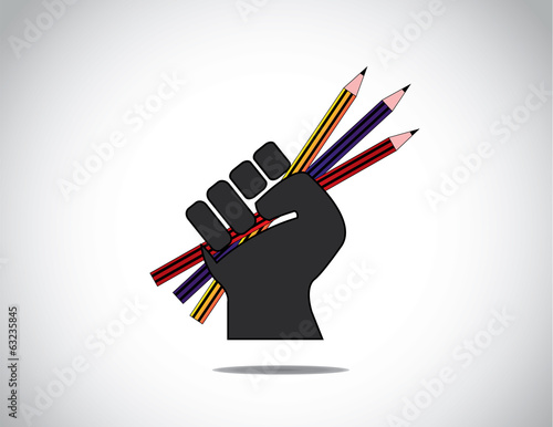 human hand strongly holding colorful pencils - education concept