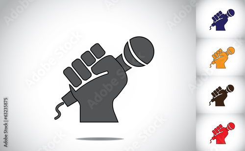 human hand strongly holding mic microphone - karaoke concept