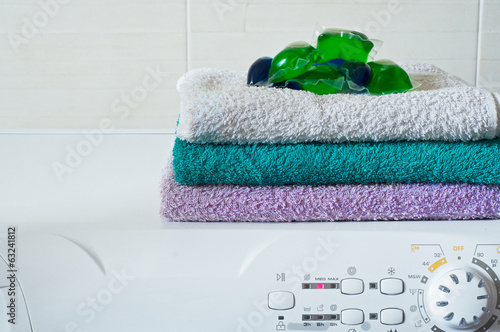 Capsule detergent on top of washing machine