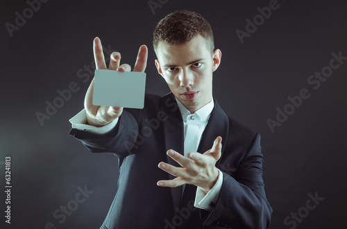Magician Showing Card