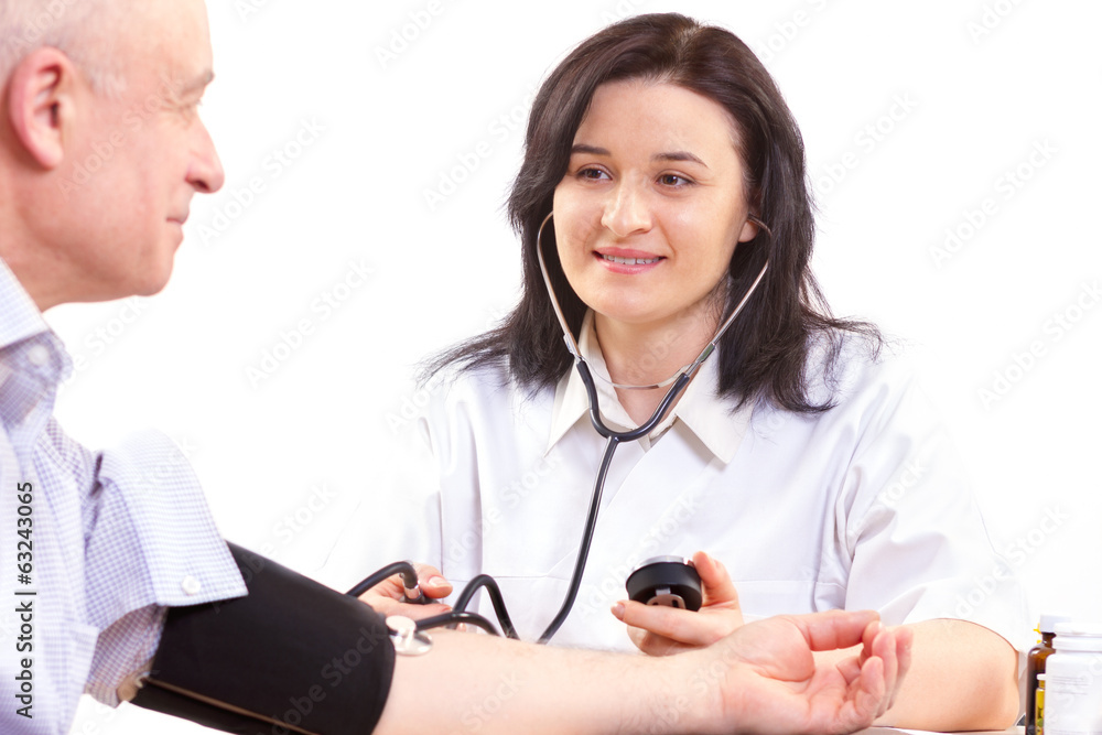 Doctor measuring blood pressure of senior man Doctor measuring blood pressure of senior man