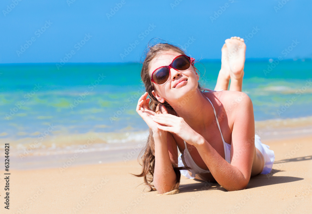 long haired woman in bikini with flower in hair on tropical long haired woman in bikini with flower in hair on tropical
