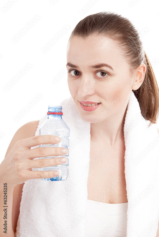 Young woman with bottle of water covering white background. Young woman with bottle of water covering white background.