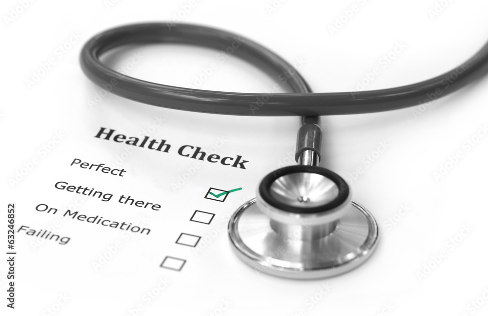 Health checklist and a stethoscope Health checklist and a stethoscope