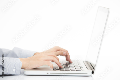 Lady typing on laptop