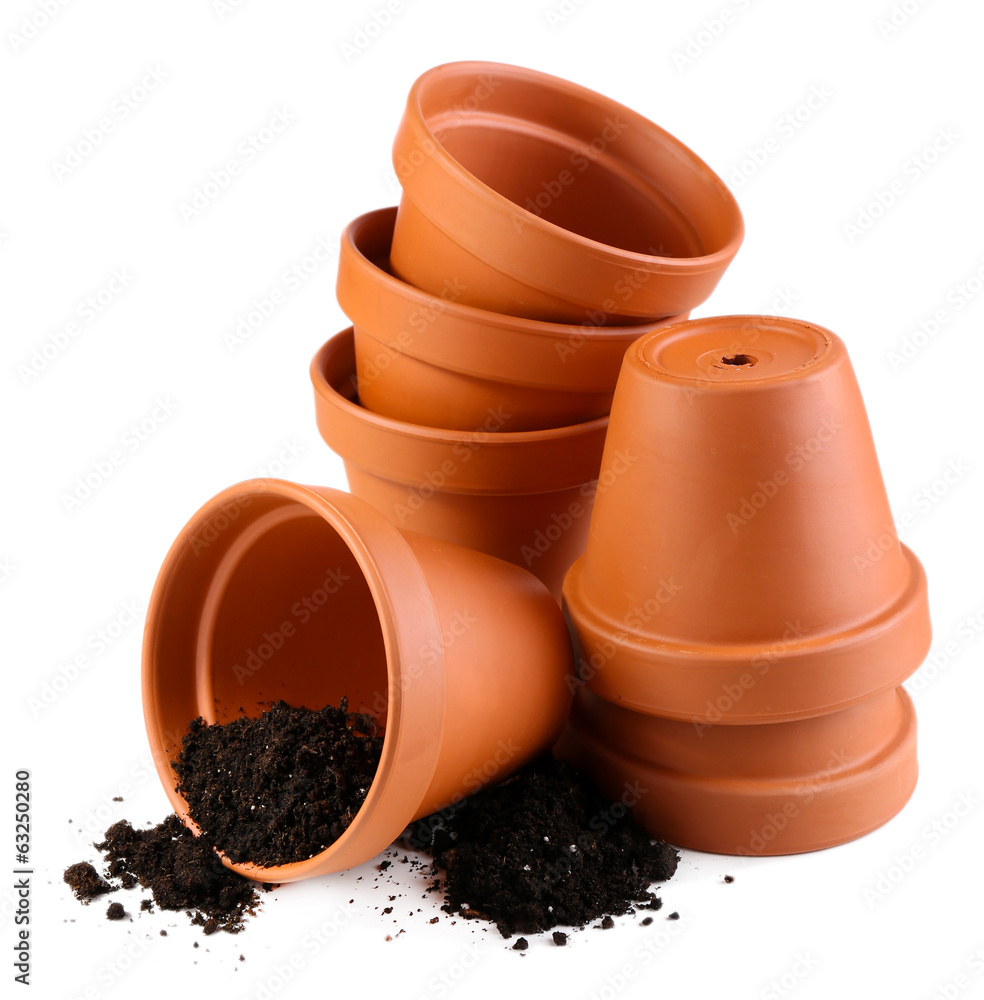 Clay flower pots and soil, isolated on white Clay flower pots and soil, isolated on white