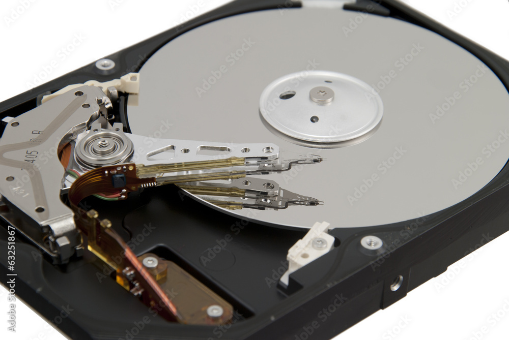 Detail of hard disk drive isolated on white background Detail of hard disk drive isolated on white background