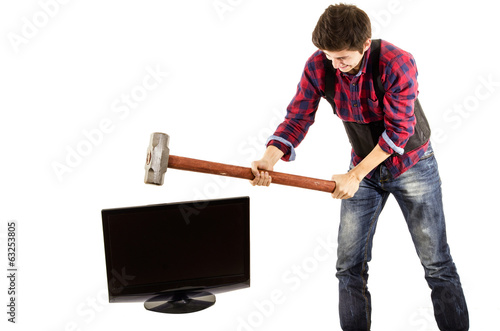 man  with sledgehammer breaking a tv lcd