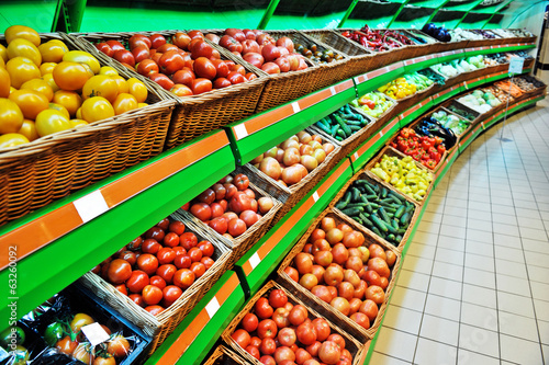 shelves with vegetables in a shop