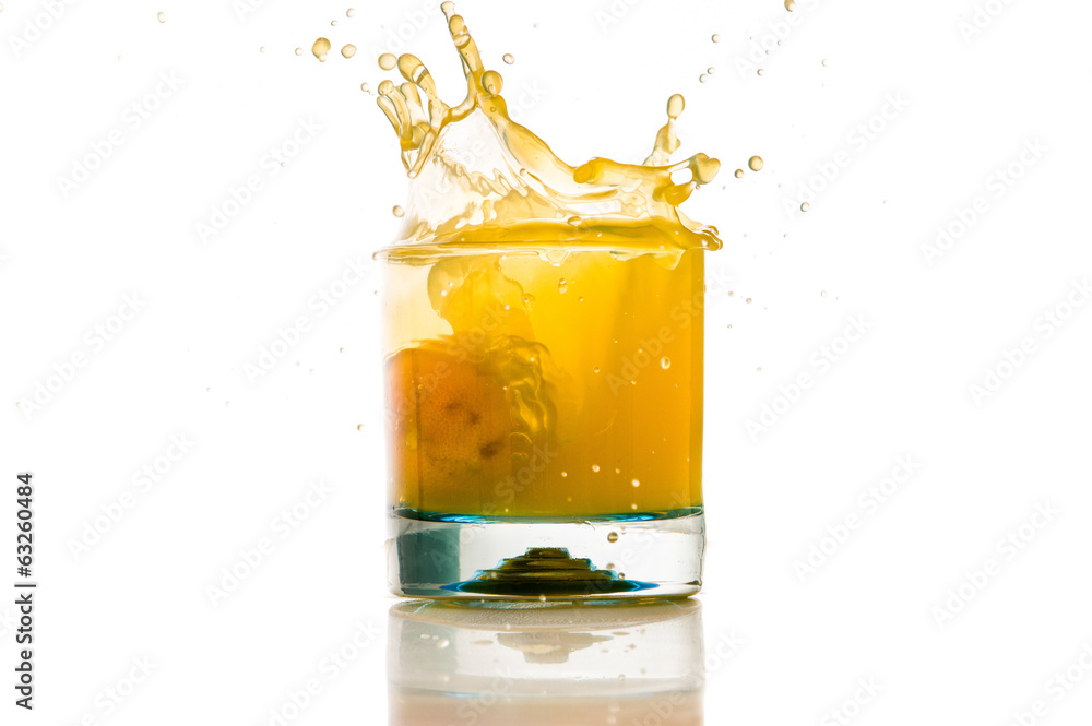 pouring orange juice splash on a white background pouring orange juice splash on a white background