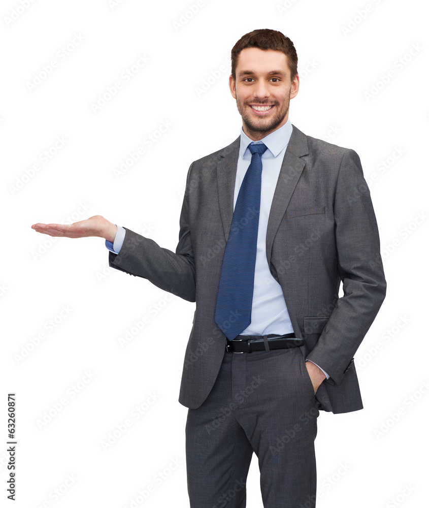 man showing something on the palm of his hand man showing something on the palm of his hand