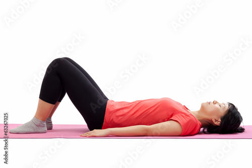 Woman laying down for starting exercise