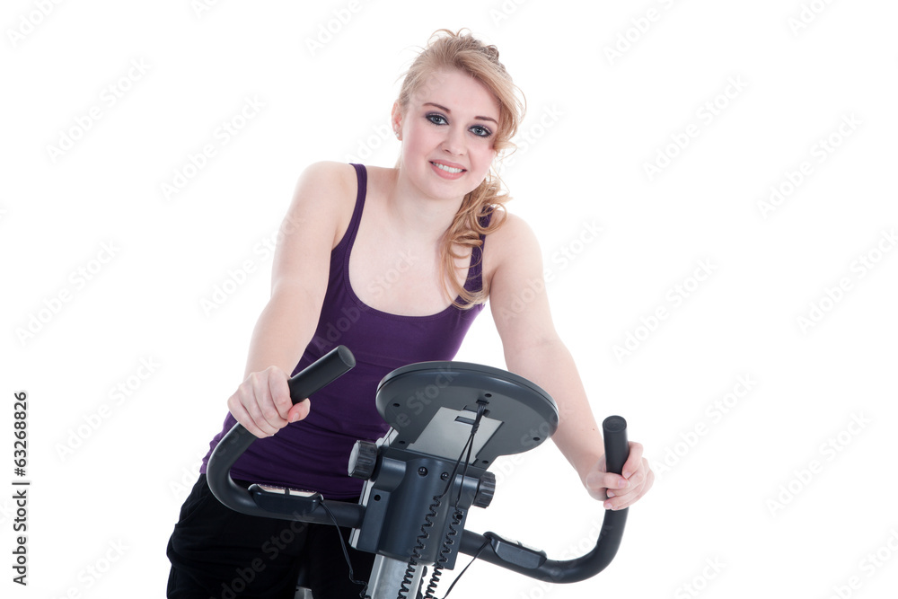 Sportliche Frau mit Heimtrainer Porträt Sportliche Frau mit Heimtrainer Porträt