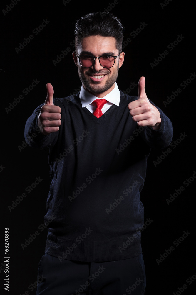 business man shows both thumbs up business man shows both thumbs up