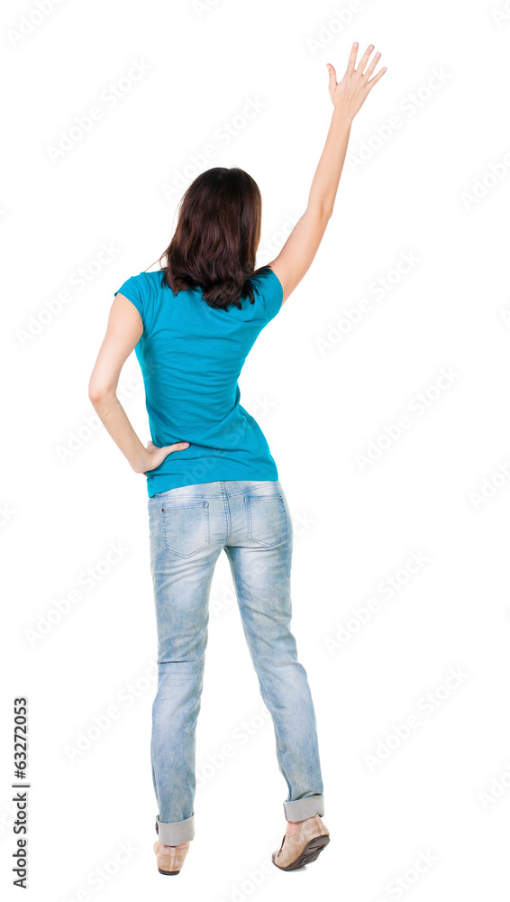 Back view of beautiful woman welcomes. Back view of beautiful woman welcomes.