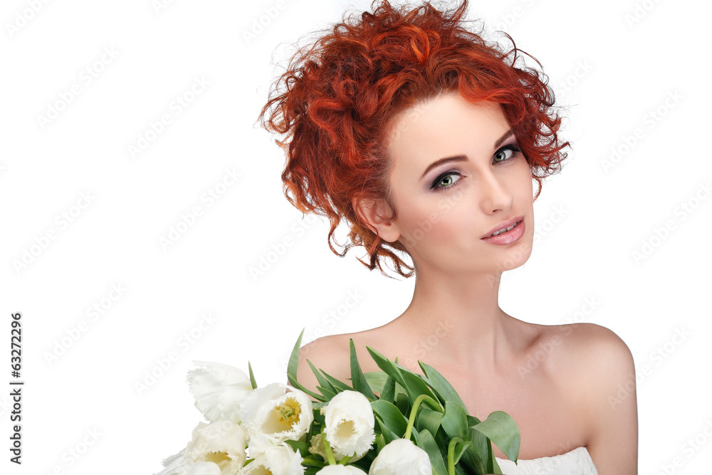 beautiful young redheaded girl with white tulips