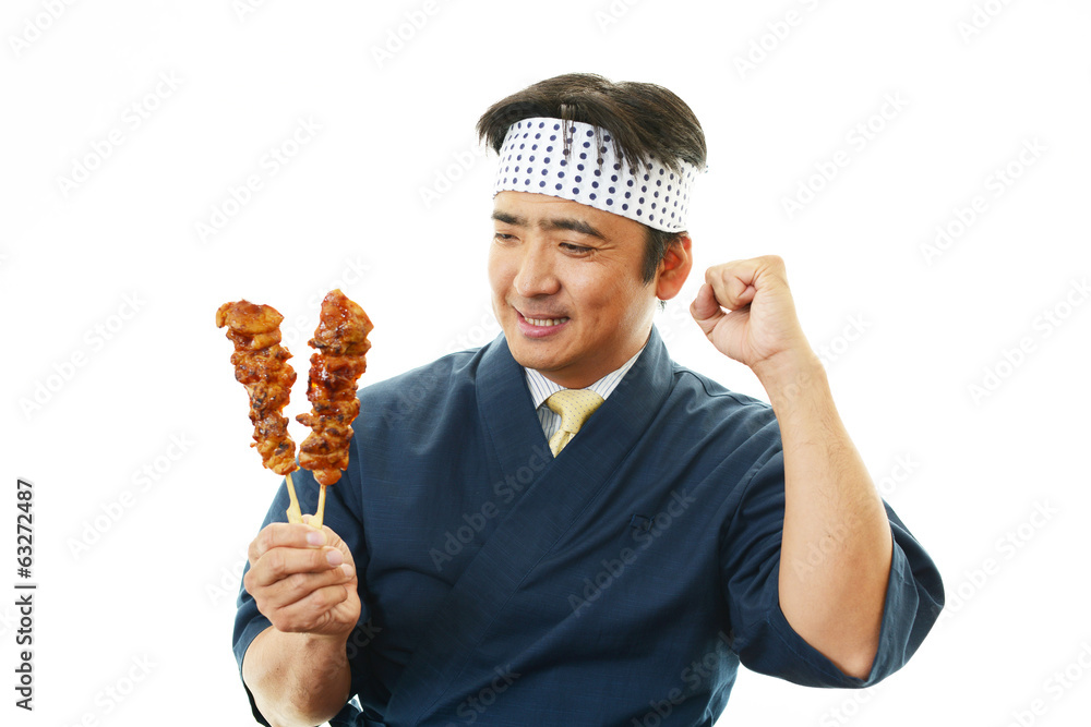 ガッツポーズの寿司職人