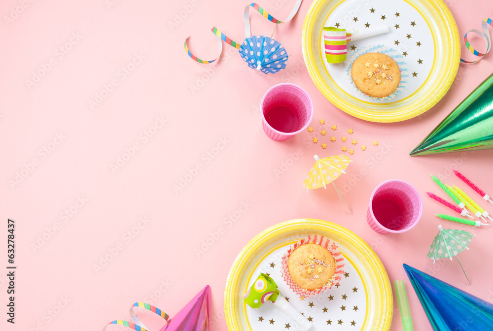 Girl birthday decorations on pink table Girl birthday decorations on pink table