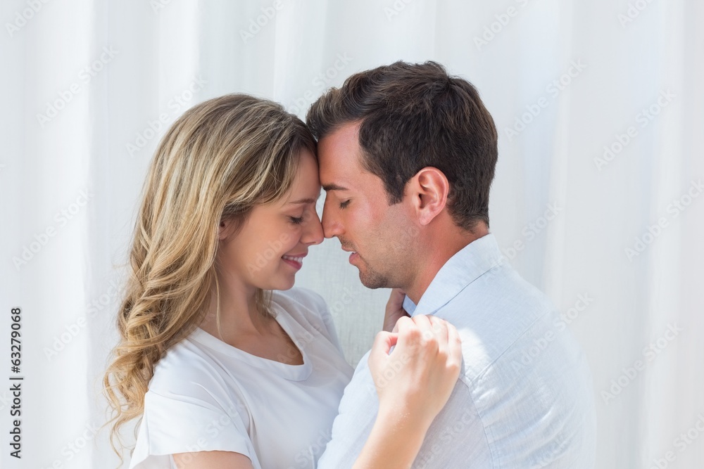 Loving young couple with eyes closed Loving young couple with eyes closed