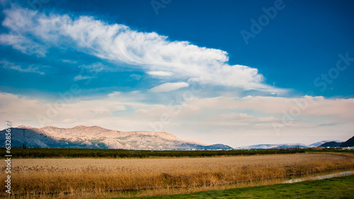 Distant hills with valley in front. Autumn landscape
