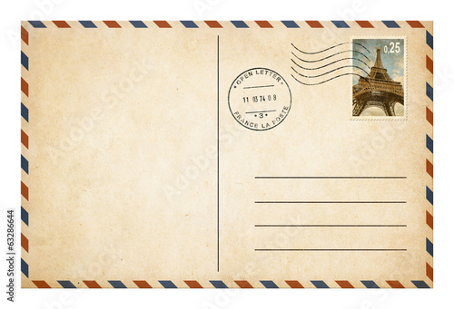 Old style postcard or envelope with postage stamp isolated photo