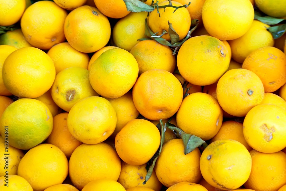 Orange fruits for sale at farmers market.