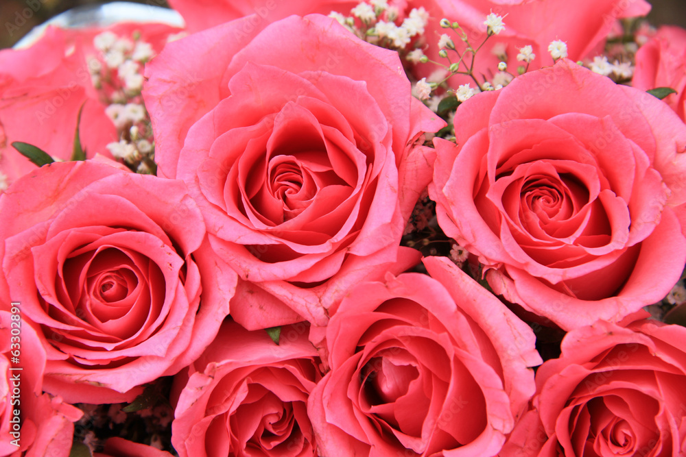 Pink roses in a bridal arrangement Pink roses in a bridal arrangement