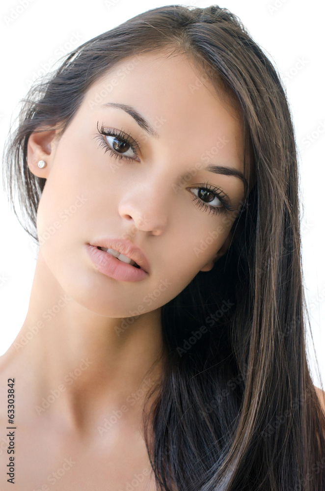 Portrait of a beautiful brunette girl with long hair. Portrait of a beautiful brunette girl with long hair.
